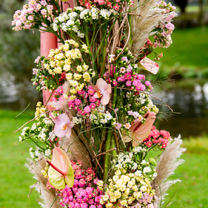 Decorate your wedding venue with a flower gazebo for the wedding ceremony. This gazebo is simple and custom made with copper tubing and decorated with a beautiful soft colored fabric. The flower piece is made with a structure of metal frame which is welde